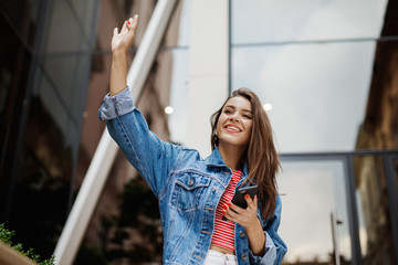 Young woman texting or using smartphone