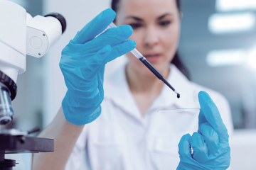 Biological tests. Selective focus of a test sample of the liquid being used in biological research