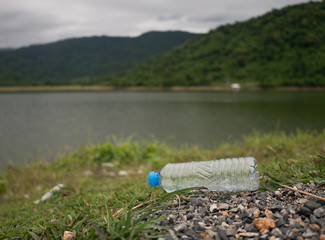 Obraz premium Plastic bottle is dumped by tourists
