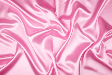 Pink luxury satin fabric texture for background