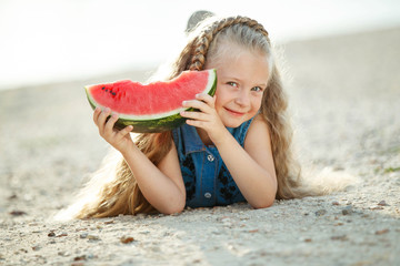 Child with watermelon 
