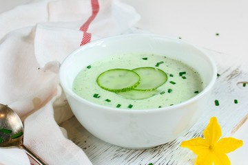 Homemade Chilled Cucumber Soup served in a white bowl