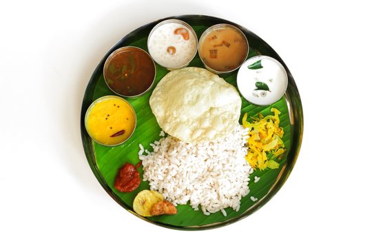 Traditional Onam Feast / South Indian  Vegetarian Thali on banana leaf