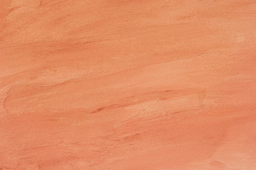 Art of orange color cement wall texture.