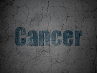 Healthcare concept: Blue Cancer on grunge textured concrete wall background