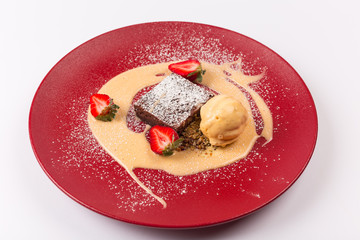 Front and Top View - Sweet Desert - Brownie with vanilla sauce.
