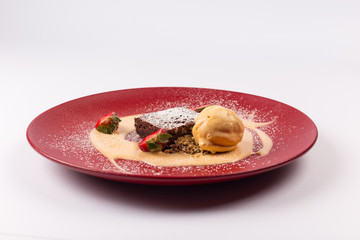 Front and Top View - Sweet Desert - Brownie with vanilla sauce.