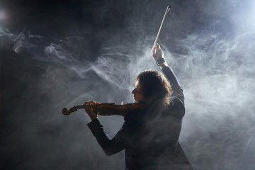 Classical musician violinist with a musical instrument