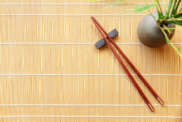 chopsticks on bamboo mat,copy space.