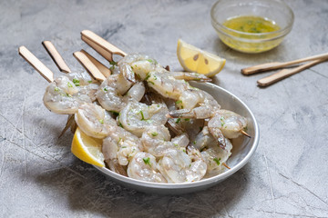 Raw Shrimps on Wooden Skewers