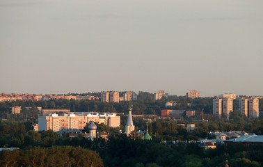 Fototapeta na wymiar Yaroslavl. View of the city and the Peter and Paul Park in the light of the setting sun
