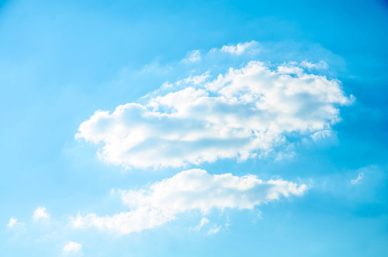 A graphical resource consisting of a cloudy sky on a sunny day.
