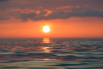 Fototapeta na wymiar sun track on the calm sea
