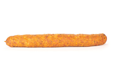 One whole dry smoked ham sausage isolated on white