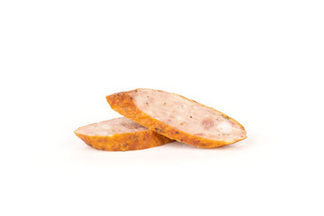 Group of two slices of dry smoked ham sausage isolated on white