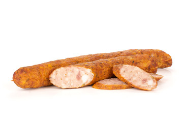 Group of one whole one half two slices of dry smoked ham sausage isolated on white