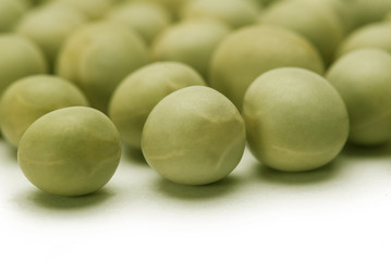 Green peas on white background 