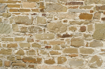 orange wall of a wild stone close up
