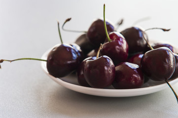 Fresh ripe bird cherries close up shot