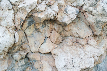 orange wall of a wild stone close up