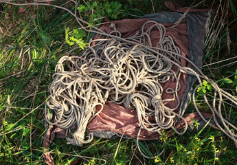 Texture of jute ropes used in shibari, Japanese bondage technique. Many skeins and loose ropes for...