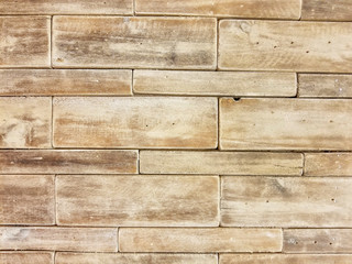 close up of layered wooden brick pattern