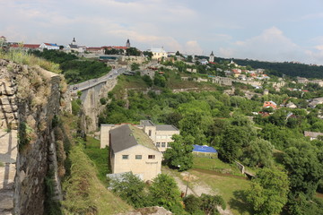 Fototapeta na wymiar The fortress wall of the Ukrainian fortress is perfectly preserved in the city of Kamenetz-Podolsk