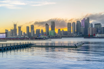 Fototapeta premium Qingdao Bay yacht wharf and urban architectural landscape
