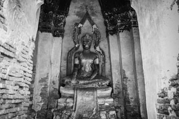 Ruined Buddha sculpture of Wat Chai Watthanaram, Ayutthaya, Thailand