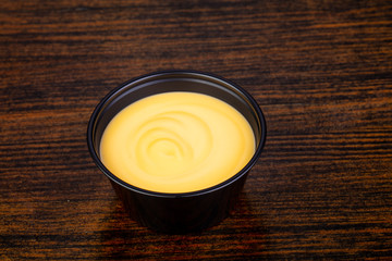 Cheese sauce portion