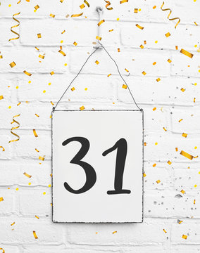 31 years old birthday anniversary party congratulations card text with golden confetti
