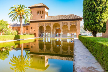 GRANADA, SPAIN -  JULY 12, 2016: The Ladies Tower,  Torre de las Damas, at the  Royal complex of Alhambra, Granada, Andalusia, Spain.