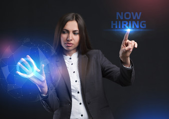 The concept of business, technology, the Internet and the network. A young entrepreneur working on a virtual screen of the future and sees the inscription: now hiring