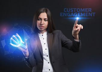 The concept of business, technology, the Internet and the network. A young entrepreneur working on a virtual screen of the future and sees the inscription: Customer engagement
