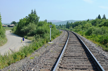 Obraz premium the rotation of the Railways and country roads on the background of wild nature in summer day 