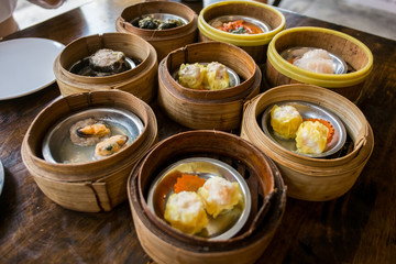 Top view Dim sum are steamed in a bamboo basket at the restaurants.