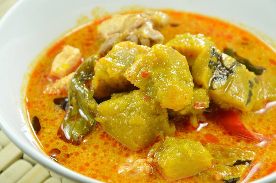 spicy boiled pumpkin with chicken in curry on bowl