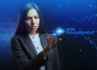 The concept of business, technology, the Internet and the network. A young entrepreneur working on a virtual screen of the future and sees the inscription: Risk management