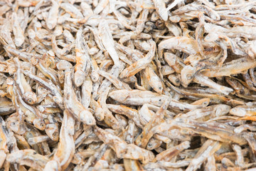 dried anchovies fish background,soft focus.