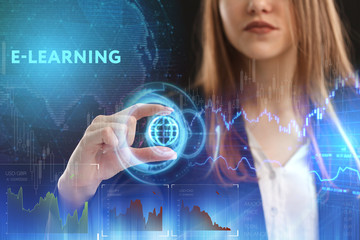 The concept of business, technology, the Internet and the network. A young entrepreneur working on a virtual screen of the future and sees the inscription: E-learning