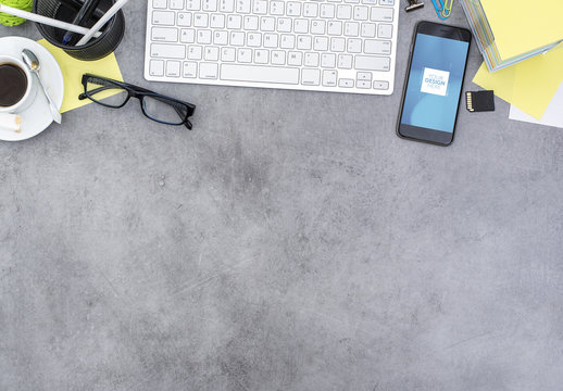 Smartphone on a Messy Desk Mockup