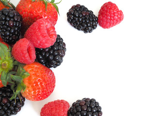 Fresh strawberry, raspberry and blackberry on wooden background, healthy food and diet.