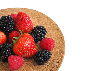 Fresh strawberry, raspberry and blackberry on wooden background, healthy food and diet.