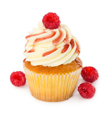 Cupcake with fresh raspberries and raspberry syrup