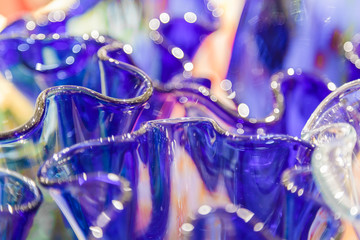 Abstract background of colored glasses of frosted plastic.