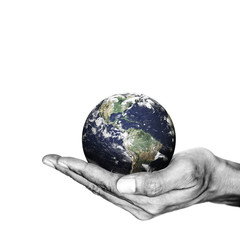Isolated opened hand and the earth on white background. Environment saving concept