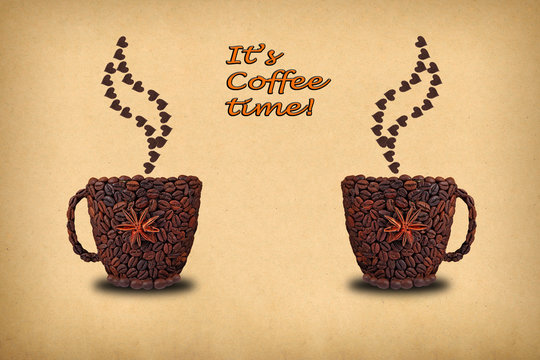 Fototapeta Creative concept photo  of two cups of coffee and hearts  made of coffee beans. Inscription  "It's coffee time!"