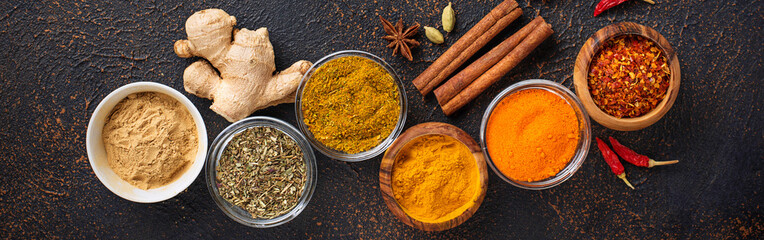 Traditional Indian spices on rusty background