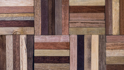 wood specimen from different tropical hardwood that grow in Indonesia. seamless wood parquet texture. natural background