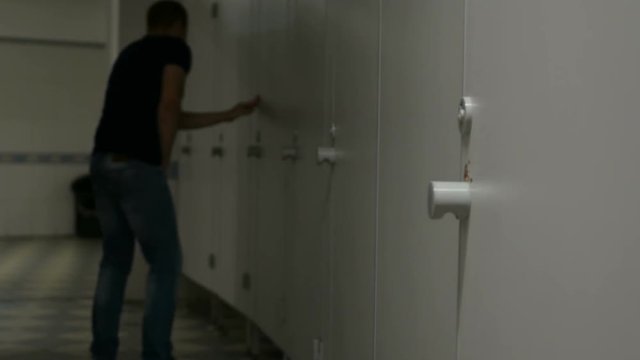 male man with frequent urination strongly wants to the restroom